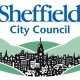 Sheffield City Council logo, blue and green on a white background. Made up from an illustration of Sheffield and the rolling hills of Yorkshire in the background.